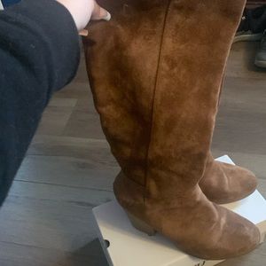 Brown knee high high heeled boots